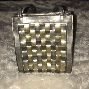 All leather metallic gold handbag.